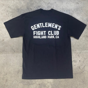 Back of black tee with white print that reads "Gentlemen's Fight Club Highland Park, CA"