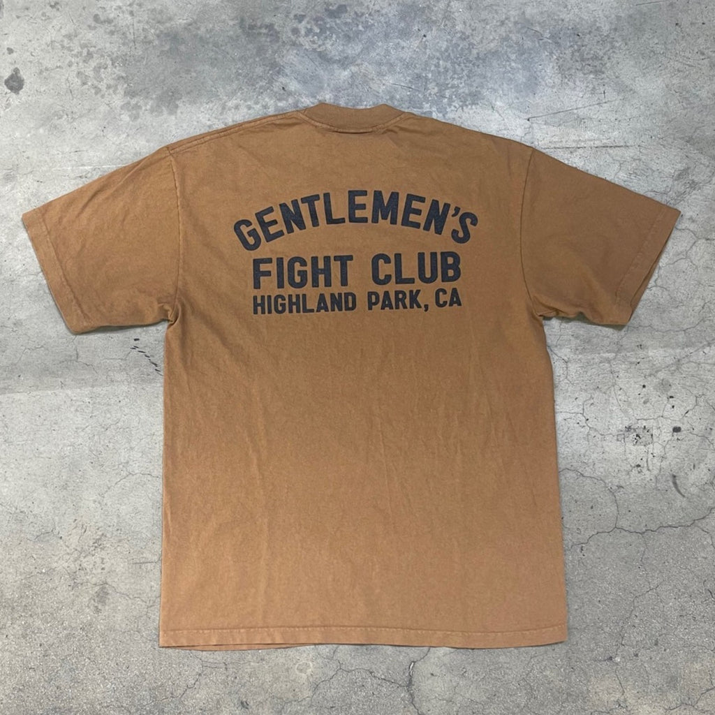 Back of whiskey brown tee with black print that reads "Gentlemen's Fight Club Highland Park, CA"