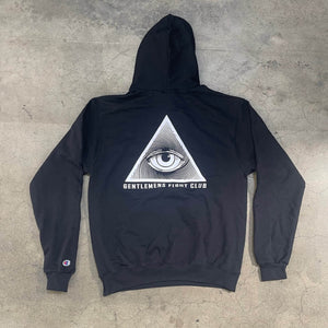 Back of black hoodie with a white printed graphic of eye in a triangle.  Reads "Gentelmen's Fight Club".  Sleeve has small Champion embroidery
